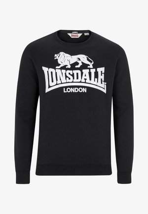 Černá mikina vyrobená z bavlny s dlouhými rukávy. Obsahuje velké bílé grafické logo s nápisem "Lonsdale London" a siluetou lva.