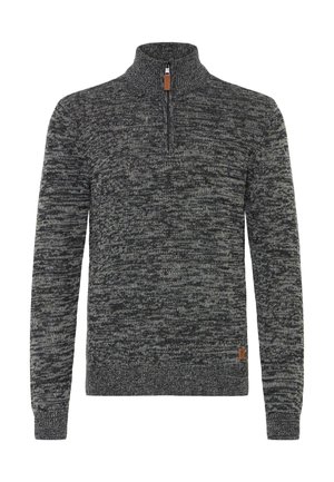 Halv-zip pullover trøje i sort og grå meleret strik. Har lange ærmer, en høj krave og et lille logo i brunt læder.