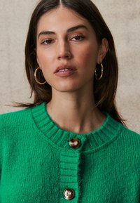 Next POCKET - Neuletakki - bright green