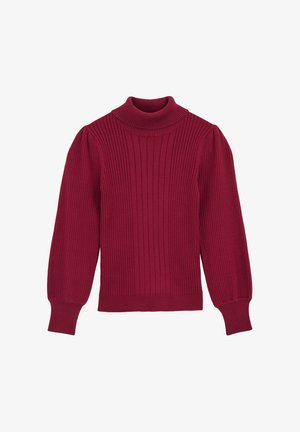 Pöttyös piros garbó pulóver hosszú, puffos ujjakból és szűk alsó részből áll. Kötött anyagból készült, függőleges csíkokkal a textúra érdekében.