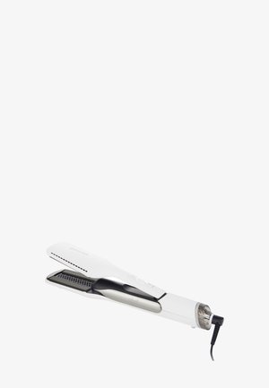 Lisseur de cheveux électrique noir et blanc avec des plaques de style nid d'abeille et un cordon attaché à l'extrémité.