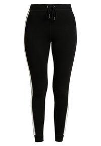 Svarta joggers med en figurnära design, tillverkade av mjukt material, med vita sidostråk och en justerbar dragsko i midjan.