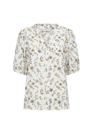 Witte blouse met korte pofmouwen, knoopsluiting aan de voorkant en een patroon van beige en bruine wilde bloemen en groene bladeren.