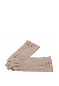 Beżowe skórzane rękawiczki o gładkiej fakturze, ze szwami i małą kokardką przy otworze na nadgarstek. Układ płaski.