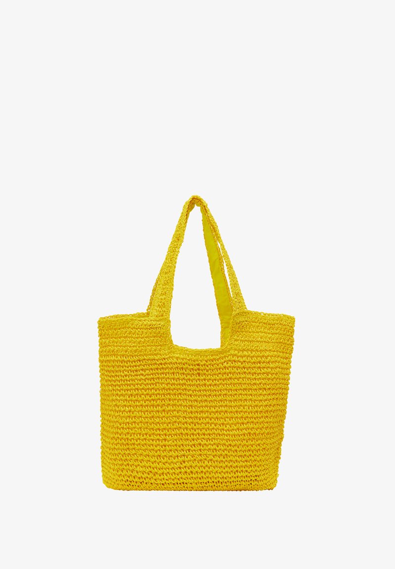 Gul vævet tote taske med rektangulær form. Har to solide håndtag og en tekstureret overflade, ideel til afslappede udflugter eller indkøb.