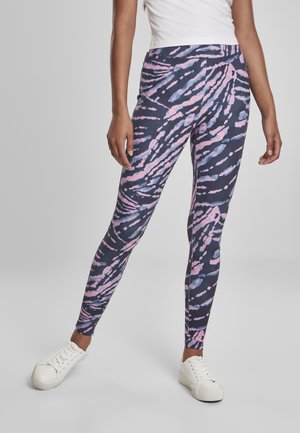 Mønstret leggings i flere farver med en mørk navy bund og abstrakte mønstre i pink og blå, lavet af strækbart stof, med en tætsiddende pasform.