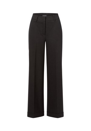 Weite, schwarze Hose aus einem glatten, strukturierten Stoff. Mit einem Bund mit Reißverschluss und verkürzten Bündchen an den Knöcheln.