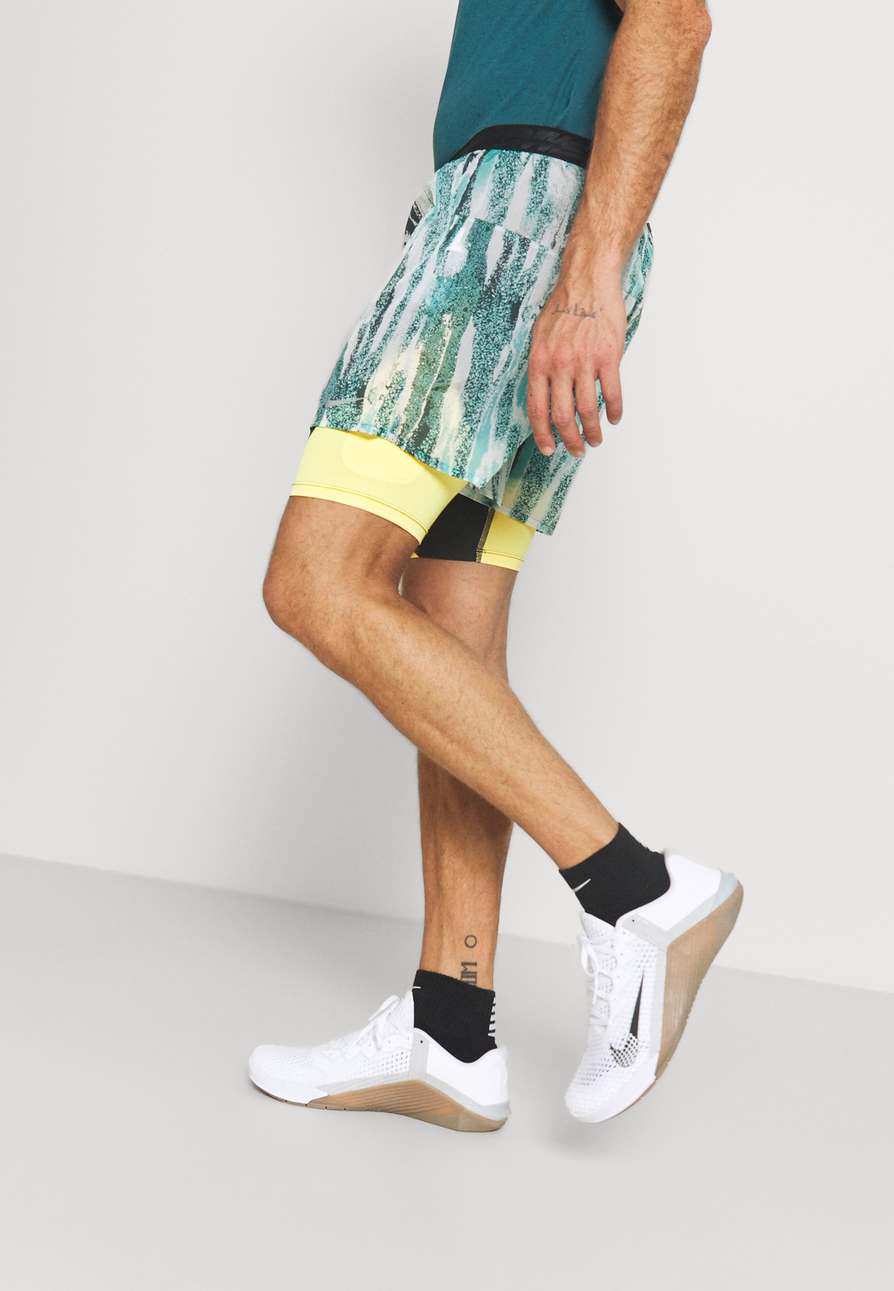 Nike Performance FLEX STRIDE 