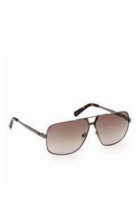 Occhiali da sole aviator in metallo con lenti marrone sfumate, montatura marrone scuro e bracci texturizzati con naselli regolabili.