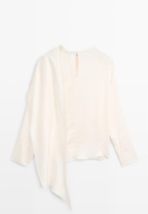 Lichtgewicht, crèmekleurige blouse met lange mouwen, van een gestructureerde stof, met een open rug en een keyhole-detail bij de halslijn.