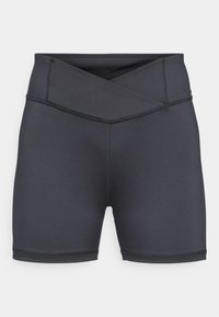 Shorts neri a vita alta realizzati in tessuto elasticizzato, con una cintura incrociata, cuciture piatte e una texture liscia.