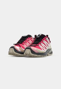 Lightweight trail shoes featuring a pink and black design, mesh upper with reflective accents, and a sturdy rubber sole with traction patterns.