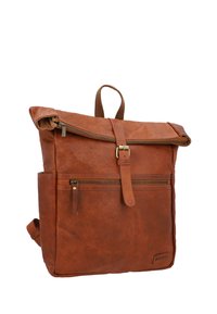 Brown leather roll-top backpack with a zipper closure, front pocket, and fabric straps. Features smooth texture with visible grain.