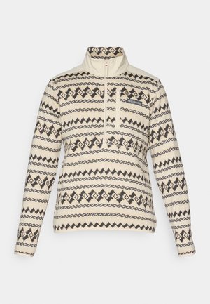 Beige fleece pullover met lange mouwen, zwart en donkerbeige geometrische patronen, een kwart-rits en een borstzak met het Columbia-logo.