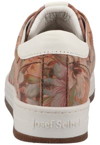 Floral print sneaker with a textured blush upper and white leather accents. Features a sturdy white sole and a cushioned collar.