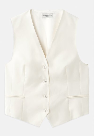 Vesta din fildeș, realizată dintr-un material neted, cu un decolteu adânc în V, cinci nasturi și două buzunare laterale. Design adaptat, cu un finisaj fără cusături.