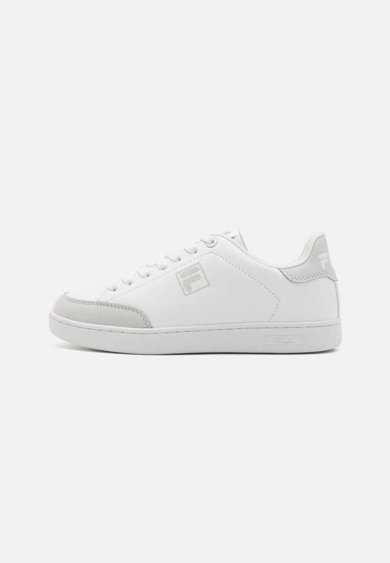 White sneaker with a smooth leather upper and gray suede accents. Round toe, flat rubber sole, and branded logo on the side and heel.