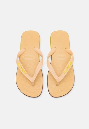 Havaianas CAPSULE UNISEX - Tåsandaler - golden