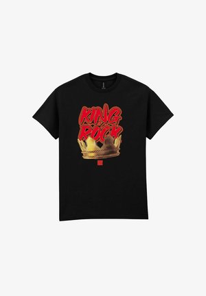 Černé bavlněné tričko s výraznou červenou a zlatou grafikou koruny, na které je výrazně zobrazeno text "KRÁL ROCKU".