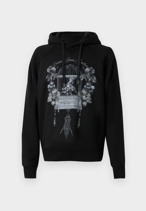 Black hoodie featuring a graphic print of a birdcage with floral embellishments. Made of soft fabric, it has a front kangaroo pocket and drawstrings.
