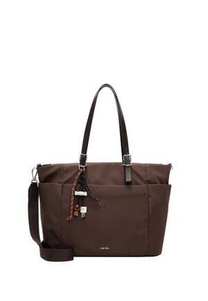 Brown tote bag with two leather handles, one detachable shoulder strap, front pocket, and decorative beads hanging on a cord.