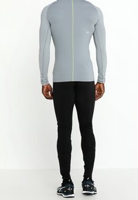 Salomon Trikoot - black