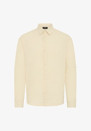 Krém színű, hosszú ujjú ing, gombos gallérral, elülső gomblistával és laza fazonnal. Sima szövettextúra.