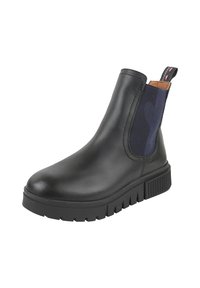 Czarne skórzane botki za kostkę z elastycznymi bocznymi panelami w kolorze granatowym. Posiadają grubą podeszwę o teksturowanym wzorze oraz uchwyt do łatwego zakładania.