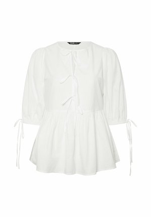 White puff-sleeve blouse in lightweight fabric with a rounded neckline, front bow ties, and elasticized sleeve cuffs; gathered peplum waist.