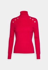Taillierter roter Rollkragenpullover aus geripptem Material mit silbernen dekorativen Knöpfen an den Schultern und langen Ärmeln.