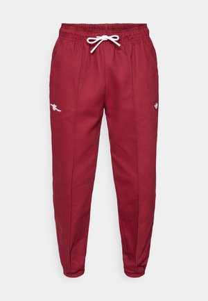 Bordowe spodnie dresowe wykonane z bawełnianej mieszanki, z regulowanym sznurkiem w pasie, elastycznymi ściągaczami na nogawkach i małymi haftowanymi detalami z logo.