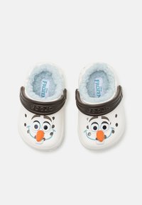 White clogs with fuzzy blue lining featuring an Olaf design. Black strap for secure fit; includes holes for ventilation.