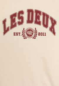 Les Deux Bluza