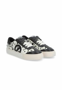 Black and white sneakers with a speckled design, featuring a rounded toe, white laces, and a textured sole. Accented with a logo on the side.
