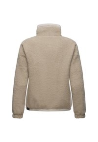 Beige fliisjakki kõrge kraega, tekstuuriga kangast, pikkade varrukatega ja elastsete mansettidega. Tagantvaade näitab disaini lihtsust ja soojust.