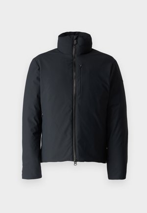 Black padded jacket with a stand collar, front zip, and a zip pocket on the chest. Smooth material, slightly fitted silhouette.