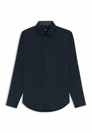 Marineblaues Langarmhemd mit Knopfverschluss, abgerundetem Saum und gemustertem Innenkragen. Glattes Material mit kontrastierenden Knöpfen.