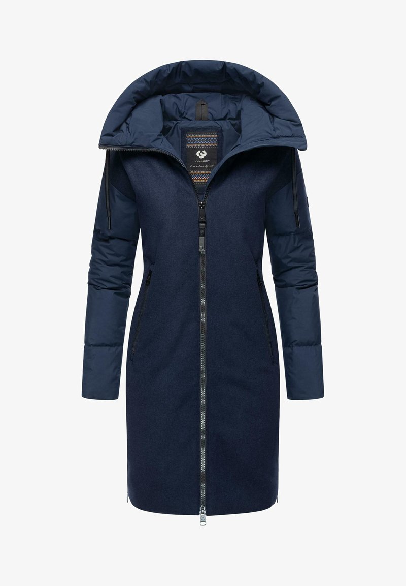 Tumed särgid pikk jakk paksu puhviga kapuutsiga, tõmblukuga ees ja küljetaskutega. Omab tekstureeritud kangast ja mustrilist voodrit.