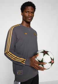 adidas Originals MANCHESTER UNITED ICON - Klub merchandise - utility black