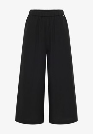 Črne široke hlače iz lahkega materiala z elastičnim pasom. Imajo gladko teksturo in minimalistično zasnovo brez žepov.
