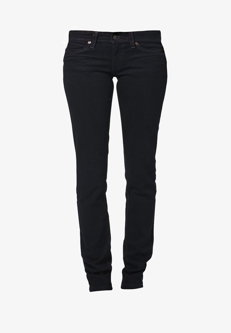 Jean noir slim avec bouton à l'avant, fermeture éclair et style cinq poches, présenté sur un fond neutre.