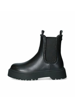 Stivale Chelsea in pelle nera con pannelli elastici laterali, punta arrotondata e suola in gomma spessa con profonde scanalature per una migliore aderenza.