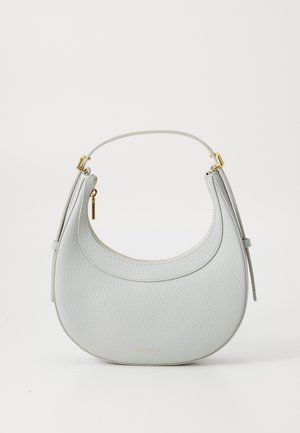 Light gray leather handbag with a curved design, gold hardware accents, a zip closure, and a single adjustable strap. Textured surface.