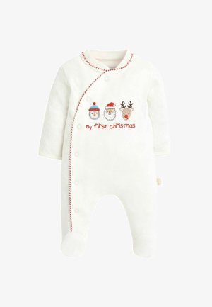 Bílý fleecový overal s kapucí a červenými detaily. Obsahuje vyšívané motivy tučňáka, Santa Clause a soba, s nápisem "moje první Vánoce."