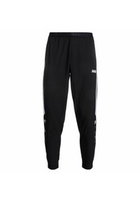 Pantalons de sport noirs avec une taille élastique, des bandes blanches sur les côtés et des détails de logo. Fabriqués en tissu léger et extensible.