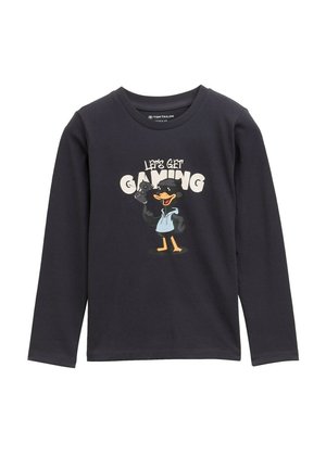 Langärmliges, navy-blaues Baumwollhemd mit einem Comic-Charakter, der Spielcontroller hält, und dem Text "LASST UNS SPIELEN". Glatte Textur, lässiges Design.