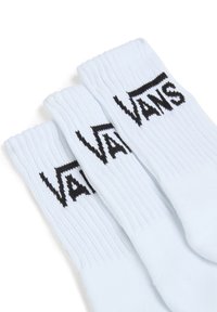 Lyseblå bomulds crew socks med ribbet tekstur og sort "VANS" logo trykt på den øverste del. Sæt med tre par.