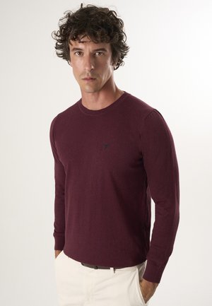 - Sweter
