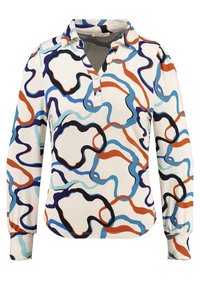 Pitkähihainen paita, jossa on pehmeä kangas ja monivärinen abstrakti kuvio sinisten, mustien ja oranssien pyörteiden muodossa kermanvaalealla taustalla.