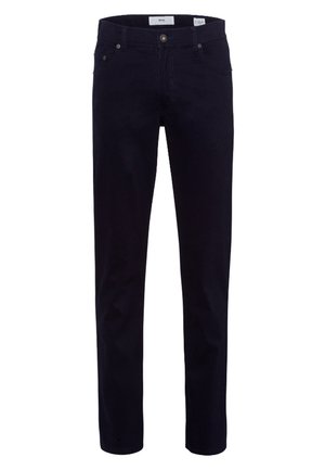 Chinos bleu marine foncé en tissu de coton. Présentent cinq poches, des passants de ceinture et une coupe droite avec des coutures contrastées.